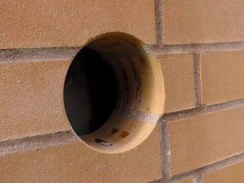 Сверление сквозных отверстий в стене под коммуникации в Минске